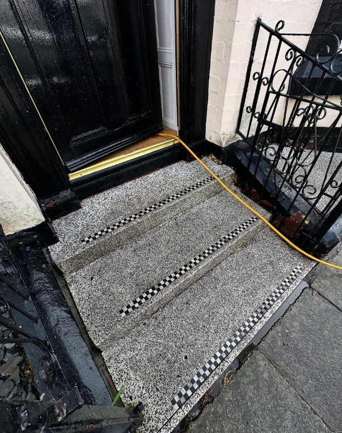 Aggregate steps before professional steam jet washing showing ingrained dirt
