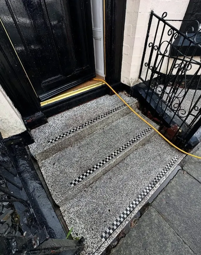 Aggregate steps before professional steam jet washing showing ingrained dirt