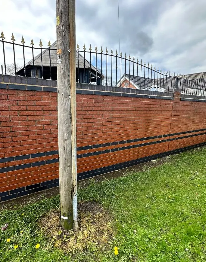 Decorative brick facade with blue engineering courses after restoration