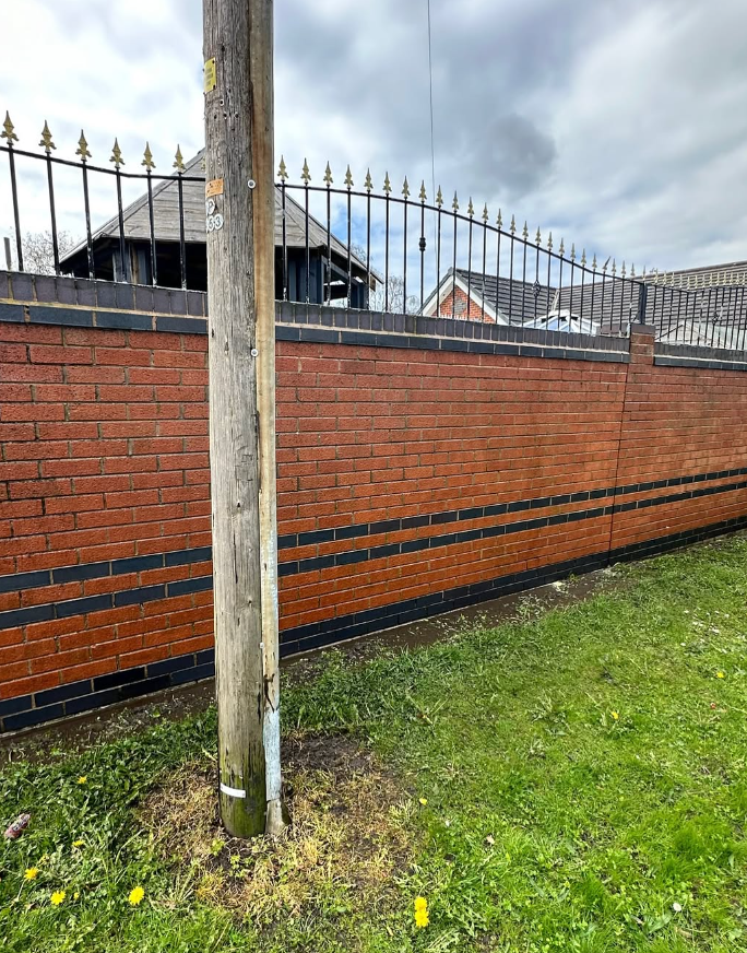 Decorative brick facade with blue engineering courses after restoration