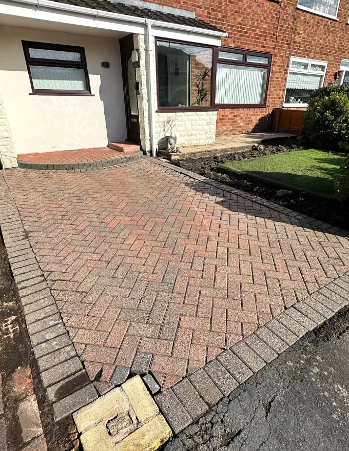 Restored block paving driveway showing vibrant colours after cleaning