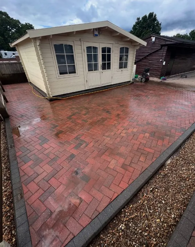 Freshly cleaned red block paving driveway restored by Marsh Exterior Cleaning in Liverpool