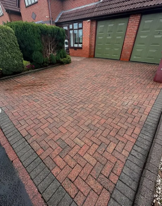 Large herringbone block paving driveway fully restored after deep cleaning